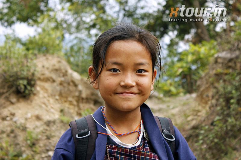 Bhutanese Girl on the Bridge in Punakha