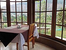 Breakfast Table at Punatshangchhu cottages with view of River and mountains