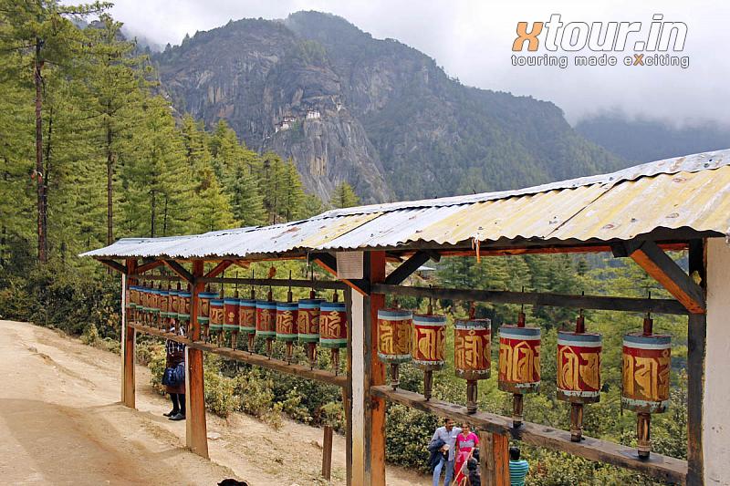 Prayer-wheel-near-taksang-cafe-and-Tigers-nest-behind