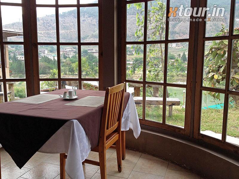 Breakfast Table at Punatshangchhu cottages with view of River and mountains