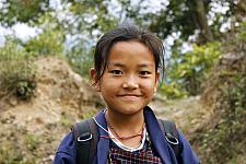 Bhutanese Girl on the Bridge in Punakha