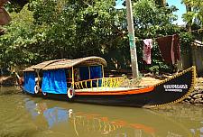 Shikara Boat Parked Anchored Near Home in Alleppey